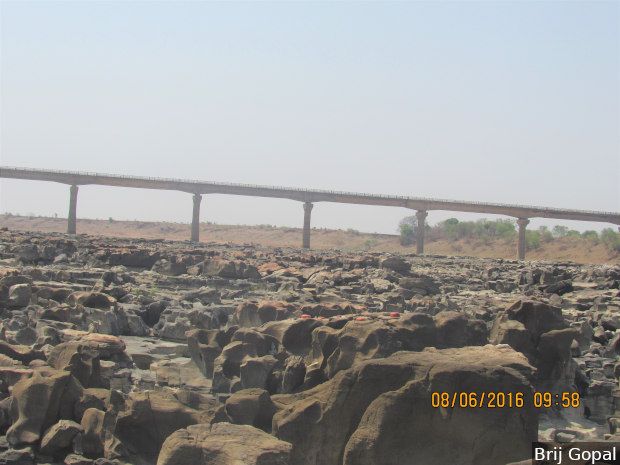 A dry Ken river bed under the Pandavan bridge in Panna district, Madhya Pradesh, in this photograph clicked in June 2016, by Brij Gopal, aquatic ecology expert and director at Centre for Inland Waters in South Asia. The National Water Development Agency maintains the river has ‘surplus’ water to share with the Betwa river. 

