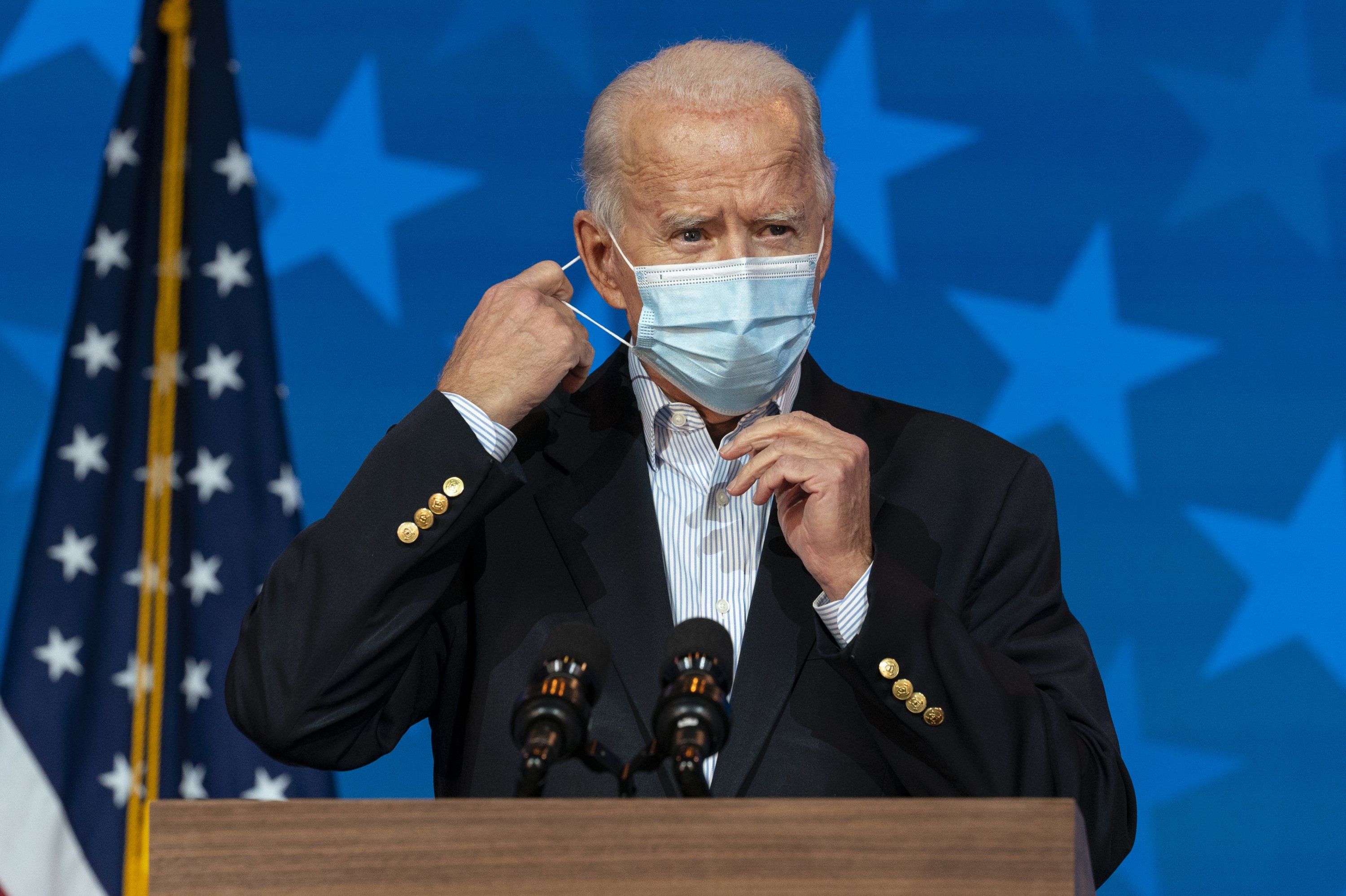 Joe Biden removes his face mask to speak at The Queen theater, in Wilmington, North Carolina, in a campaign event. Image by Stratos Brilakis / Shutterstock. United States, 2020.