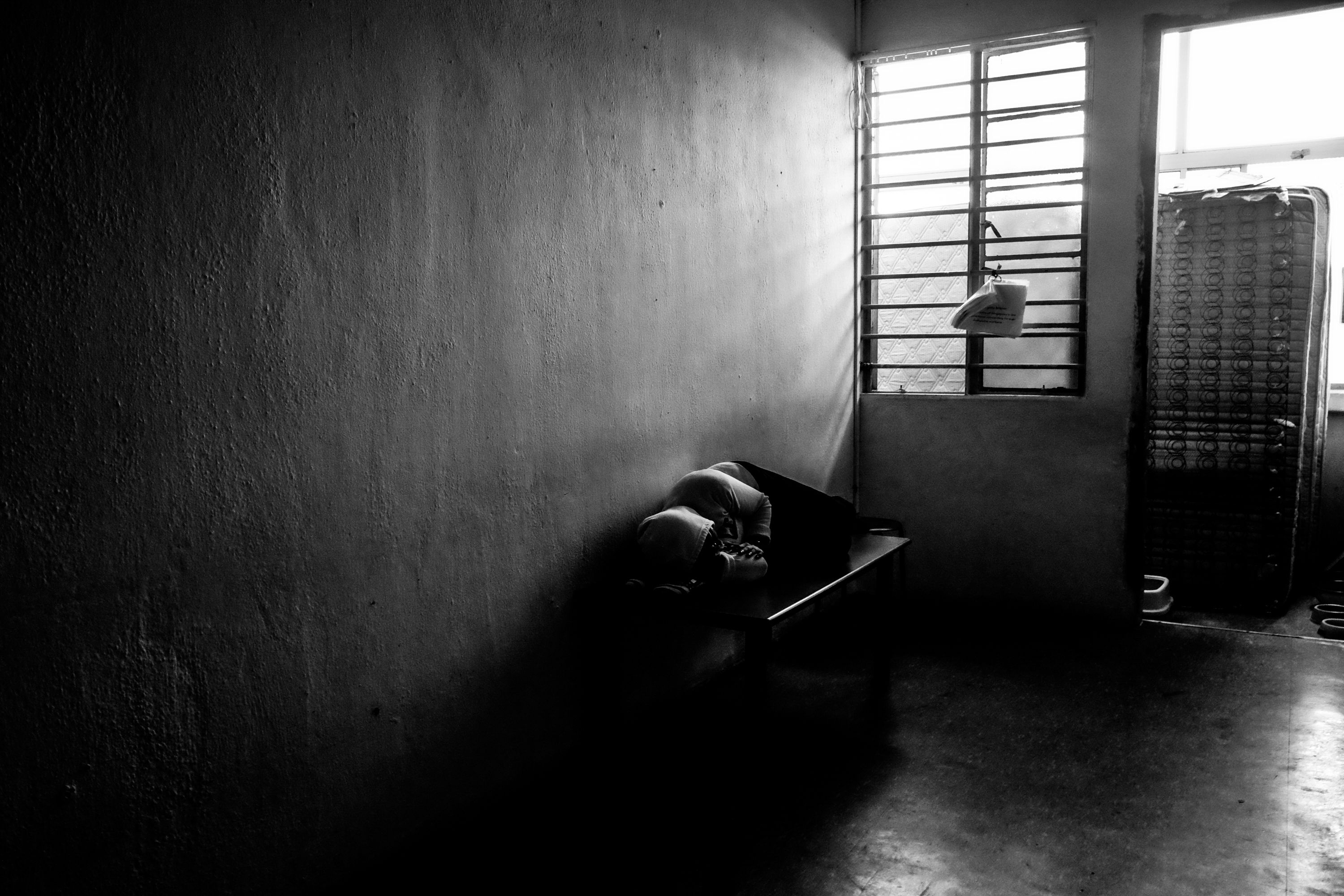 Nutarseh, 45, is a domestic worker from Indonesia. She suffers from memory loss and the shelter is investigating the cause of her condition. An Indonesian volunteer in the shelter told the photographer that Nutarseh’s employer left her on the streets until the police found her. She is now back in her home country. Image by Xyza Bacani. Singapore, 2016.