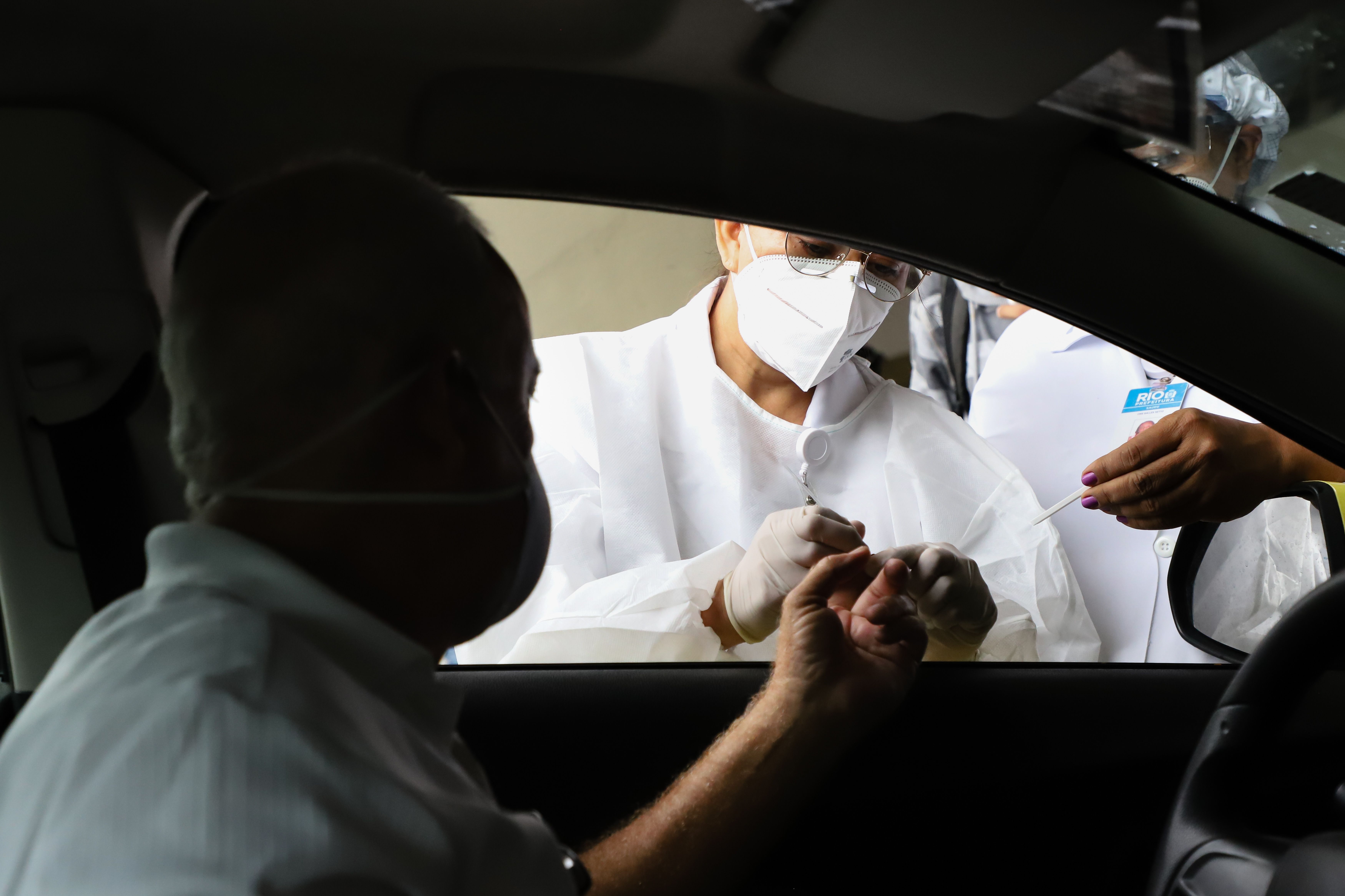 The Rio de Janeiro city hall performs coronavirus tests on taxi drivers at Sambodromo. Image by Andre_MA / Shutterstock. Brazil, 2020.