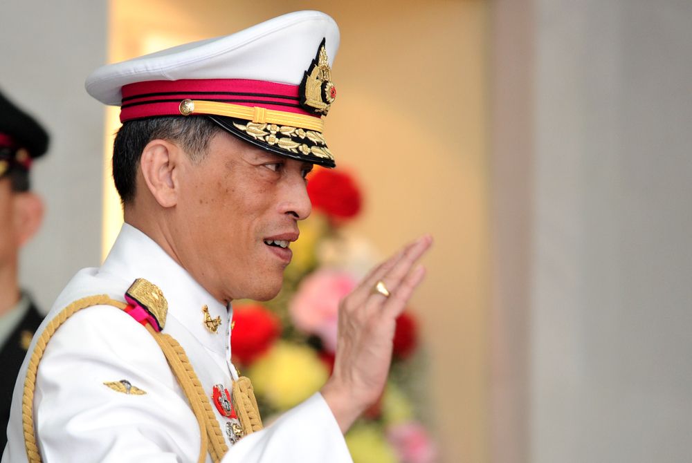 Thai King Maha Vajiralongkorn gestures to people in Bangkok. Image by Shutterstock. Thailand, 2010.