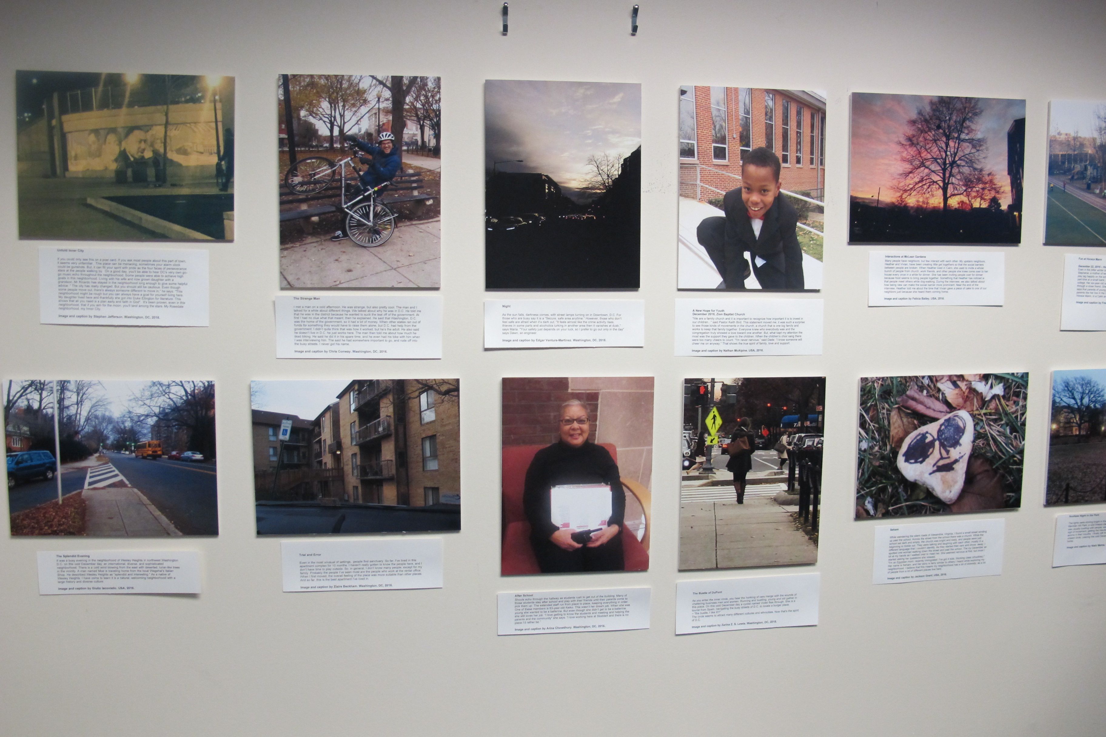 Photography and captions from Hardy Middle School students on exhibit at the Pulitzer Center. Students practiced slow journalism in Dupont Circle and in their own neighborhoods as part of the "Walk Like a Journalist" workshop. Image by Perinne Punwani. Washington, D.C., 2017. 