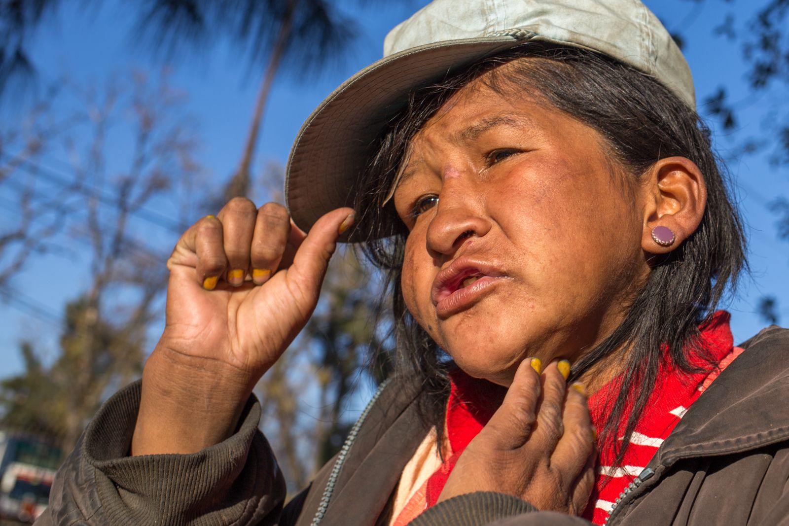 Esmeralda Cespedes, 25, said she doesn't inhale glue. But she drinks alcohol “because of the problems I have in my life. A lot of people bother me.” Image by Tracey Eaton. Bolivia, 2017.