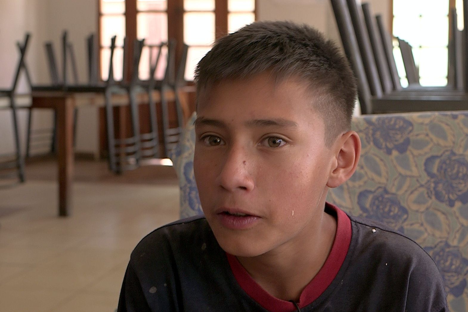 Natan Tobias, 13, said he was frightened after authorities brought him to an orphanage near Cochabamba. "I was afraid. I didn't even want to come out of my room." Image by Tracey Eaton. Bolivia, 2017.