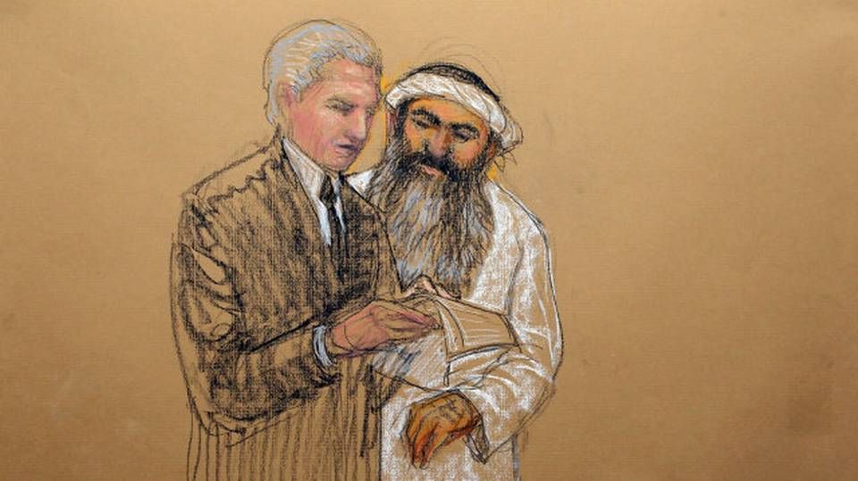 In this sketch by courtroom artist Janet Hamlin and reviewed by the U.S. Department of Defense, Khalid Sheik Mohammed, right, consults with his civilian attorney David Nevin during a break of his military hearing at the U.S. Navy base at Guantanamo Bay. Image by Janet Hamlin. Cuba, 2012.
