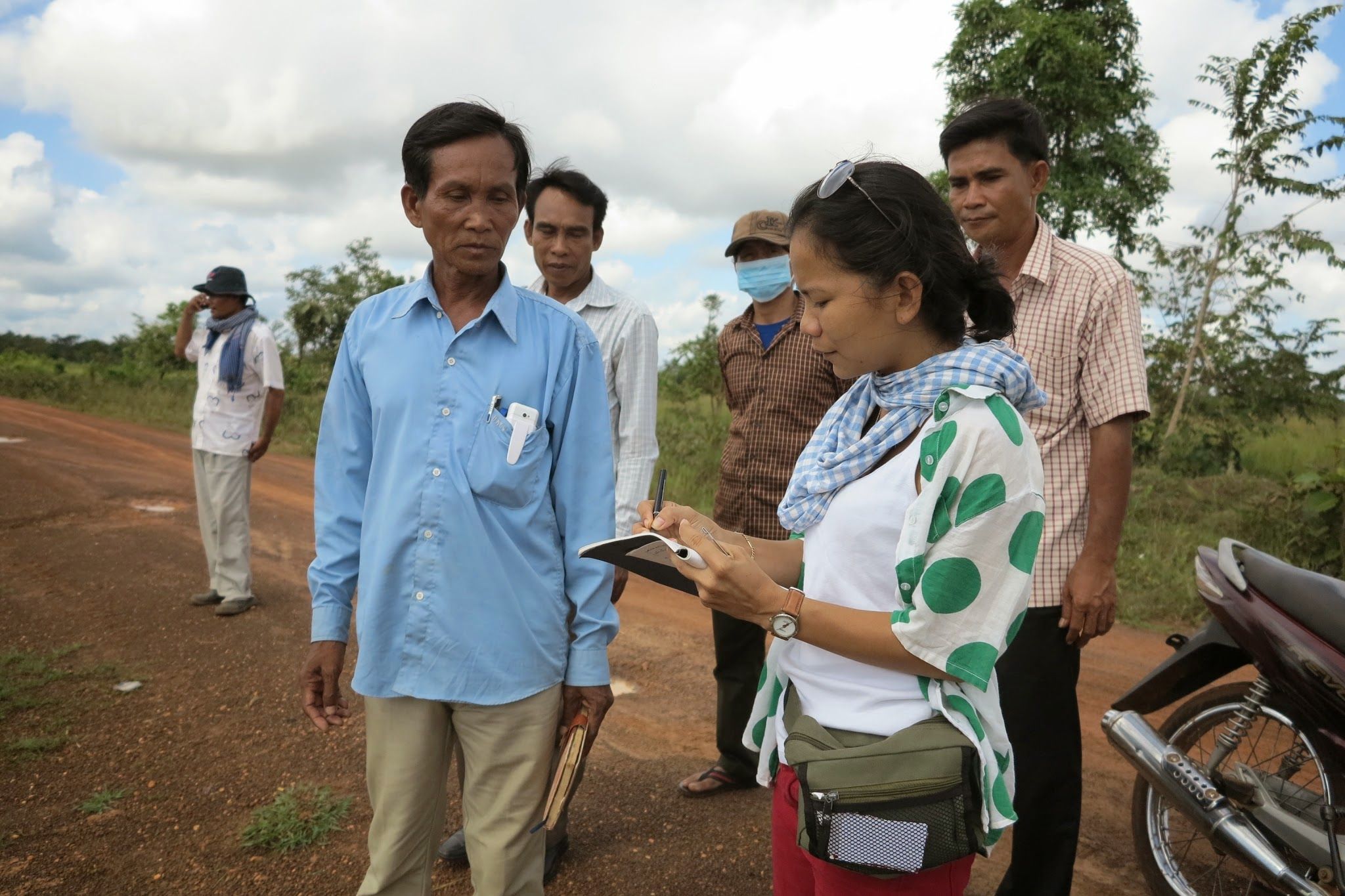 Sinary Sany, a Khmer-land activist turned freelance reporter, interviews Coy Saveuth
