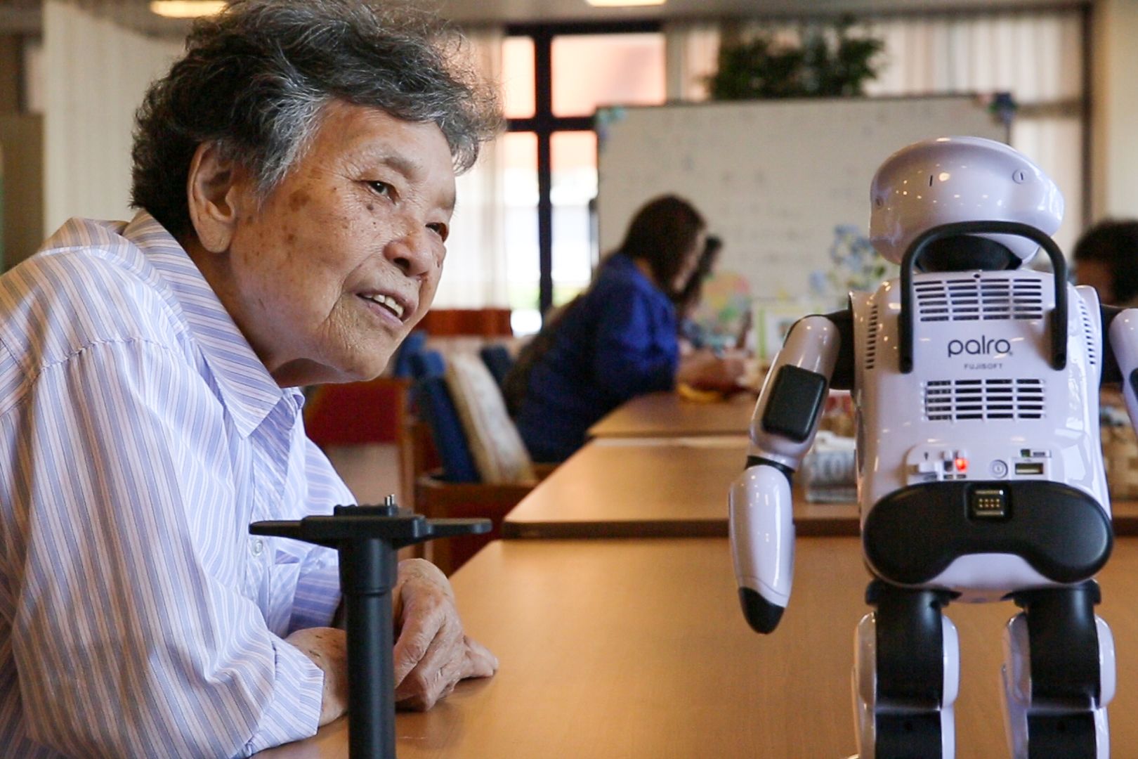 In Japan, where 27.3% of citizens are 65 and older, necessity might be just the mother of invention when it comes to approaches to elder care. This special report looks at how Japan is marrying its demographic shifts with its love of technology to find a way forward. Image by Shiho Fukada. Japan, 2017.