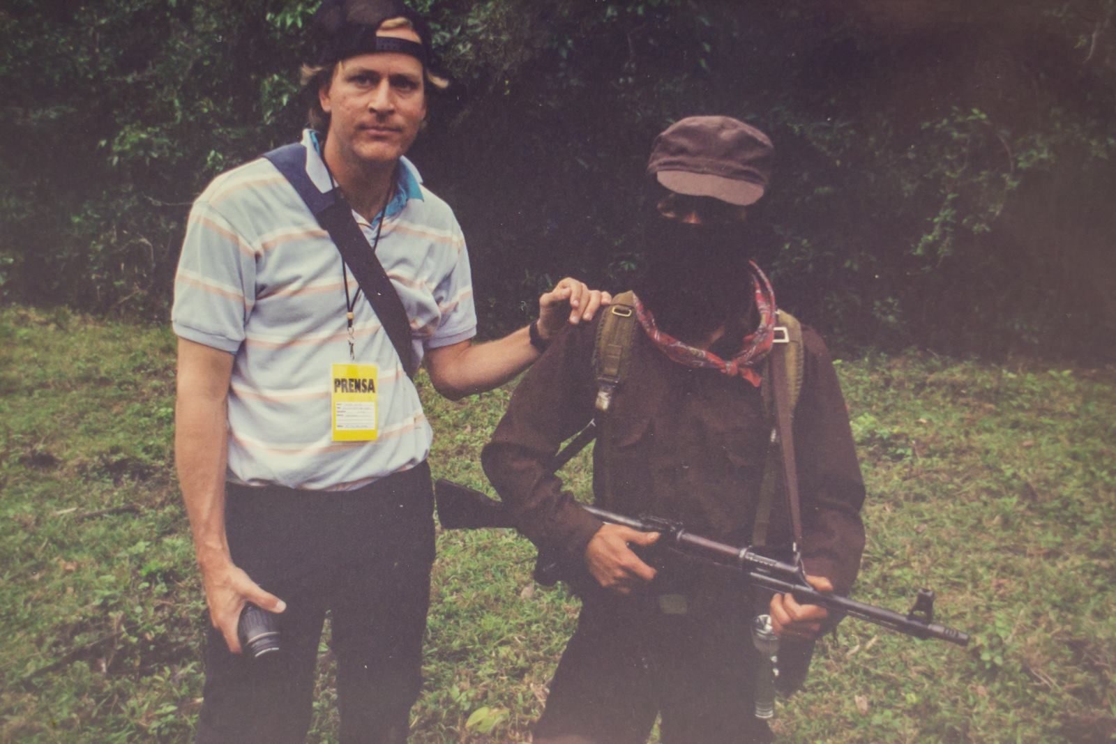 Pulitzer Center grantee and former correspondent for the Dallas Morning News, Tracey Eaton reported on the Zapatistas in 1994 when they waged a short-lived war with the Mexican government before their turn to non-violence. Here he can be seen with an armed member of the Zapatista Army of National Liberation (EZLN) at the time of their rebellion. Image courtesy of Tracey Eaton.