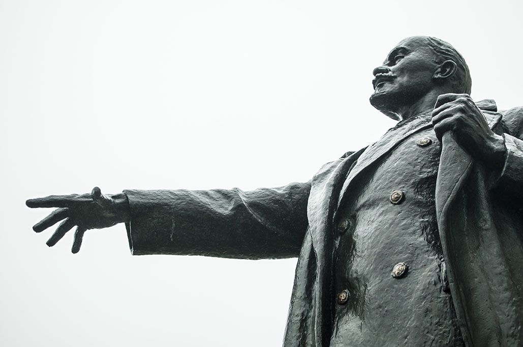 Monument of Lenin stretching his hand in Narva, Estonia. Image by valeriiaarnaud / Shutterstock.com. Estonia, 2014.