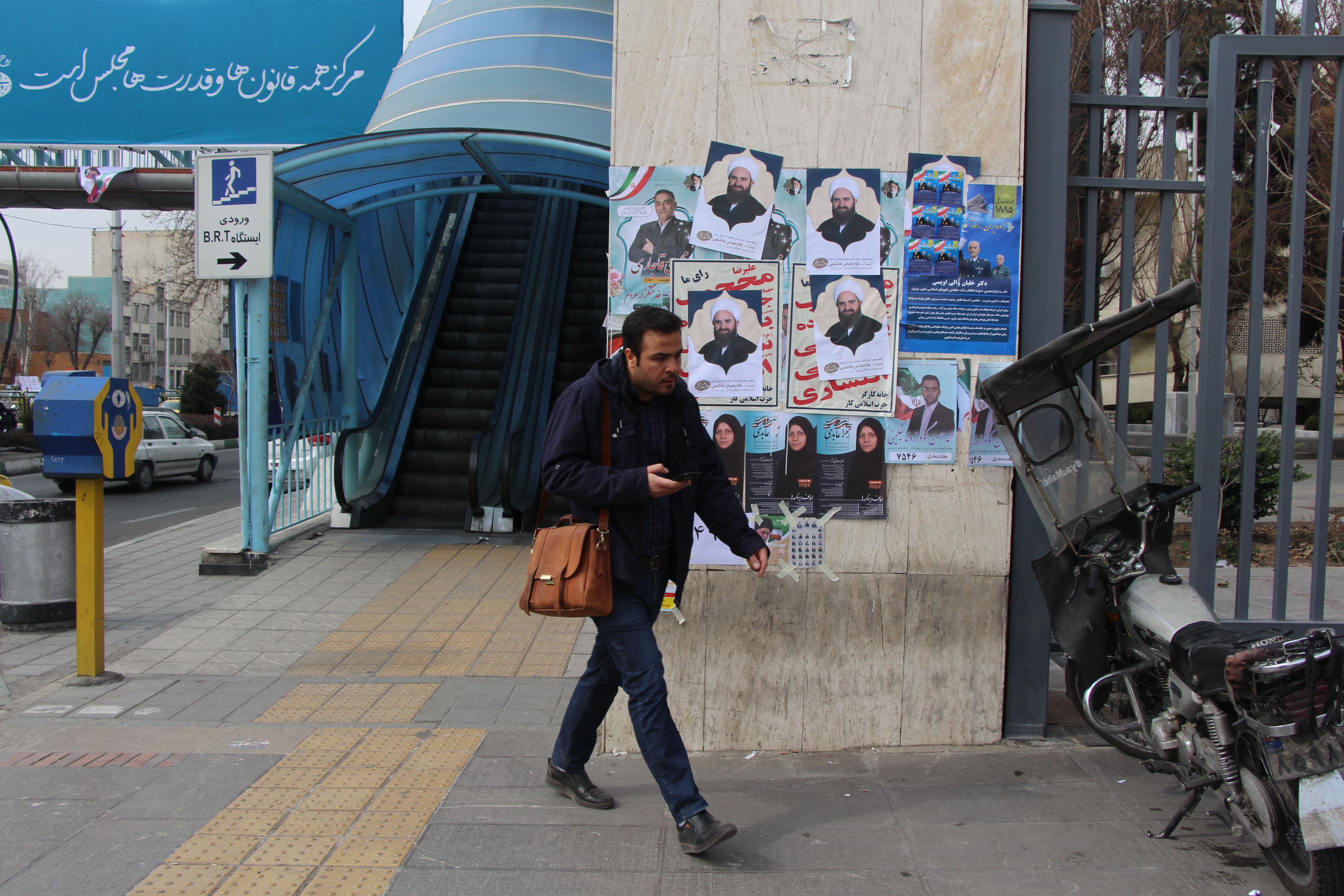 Many Tehran residents ignored the campaign posters and stayed away from the polls. Only 25 percent of Tehran residents voted. Image by Reese Erlich. Iran, 2020.