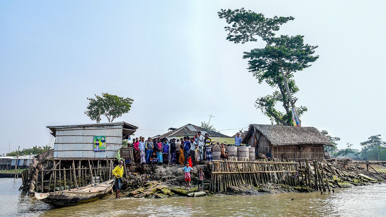 Villagers cluster on Polder 32, an artificial island in southwest Bangladesh with an uncertain future. Image by Tanmoy Bhaduri. Bangladesh, 2017.
