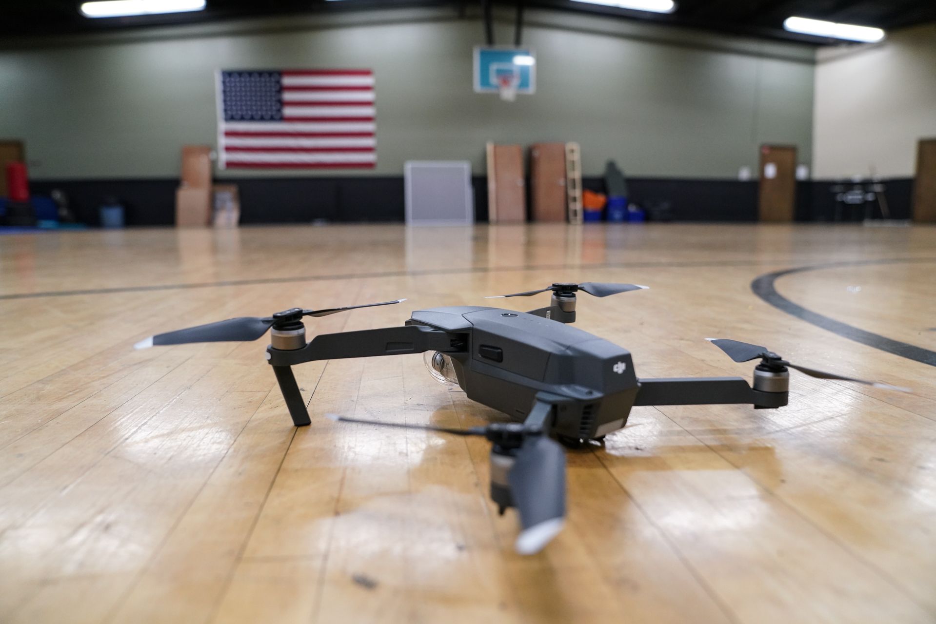 A Jeffersontown Police officer demonstrates flying the department’s DJI Mavic Pro drone in the police department gym. Image by J. Tyler Franklin. USA, 2019.