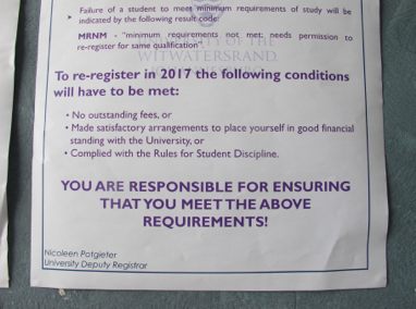 A flyer outside of the Student Representative Council at Wits University explaining the minimum requirements students must meet in order to reregister; student fee payment is paramount. Image by Lorraine Pettit. South Africa, 2016.
