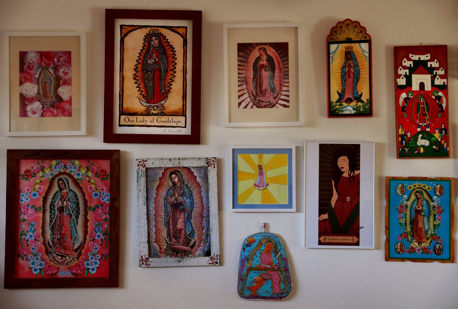  2 of 3 | Claudia Castro Luna collects images of the Virgin of Guadalupe, which are displayed in her Seattle home. Her book “Killing Marías” is comprised of 44 poems, each honoring a woman who was killed in Ciudad Juárez. The book was written with the Virgin of Guadalupe in mind. “In order for the book to do what I wanted to do, which was to give dignity, and honor the women … it was important to dwell in the realm of spirit and beauty,” she says. “A constant return to natural spaces of beauty and love.” Image by Erika Schultz / The Seattle Times. United States, 2020.