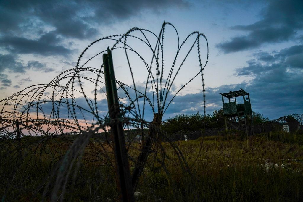 Mohammed al-Qahtani was brutally interrogated by the U.S. military at Camp X-Ray, above, a detention facility at Guantánamo Bay. Image by Doug Mills/The New York Times. Cuba, 2020.