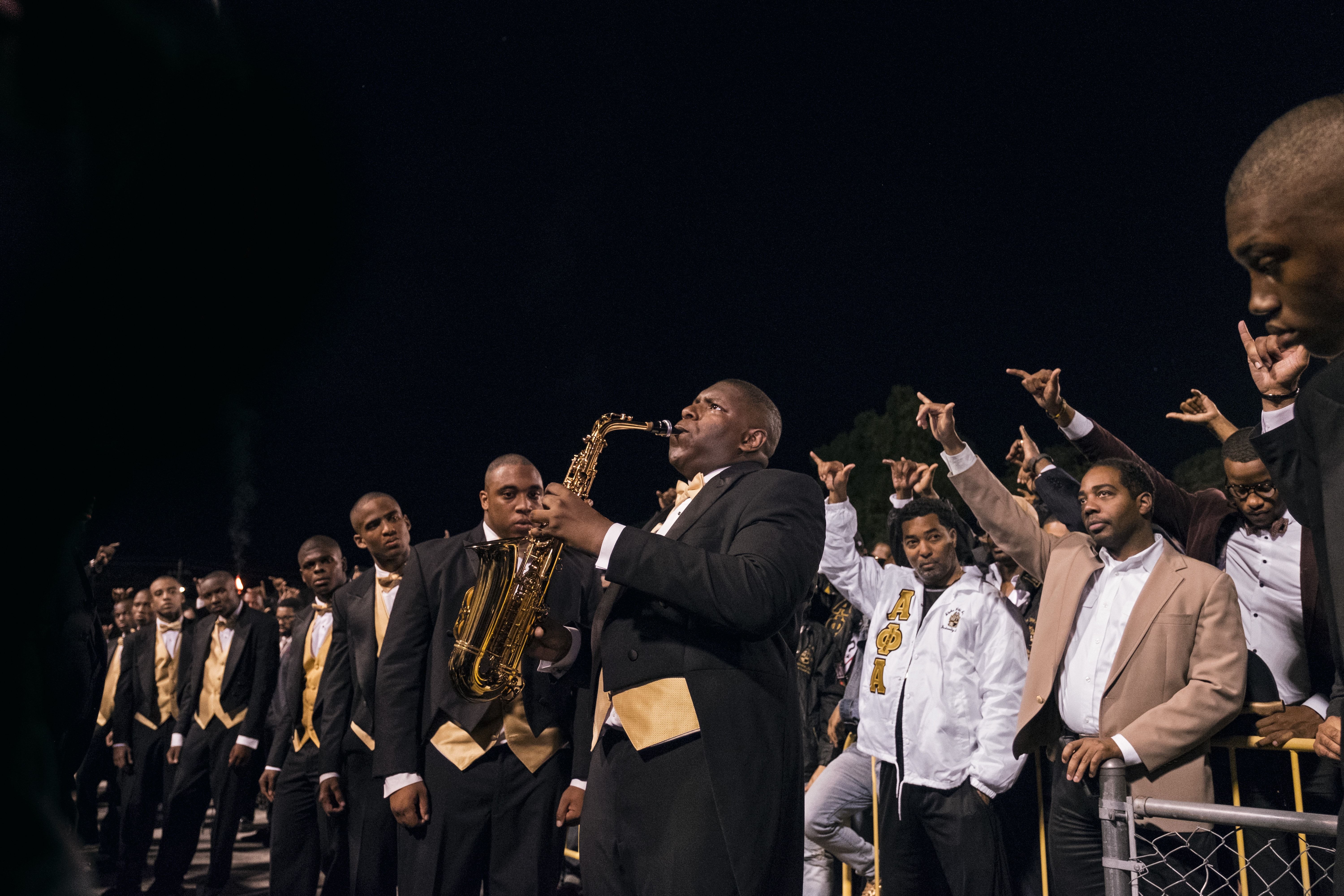 Alpha Phi Alpha fraternity alumni at Clark Atlanta University welcome new members (left) of the oldest Greek-lettered organization for African Americans, which counts Frederick Douglass, W.E.B. Du Bois, and Martin Luther King, Jr., in its ranks. Image by Nina Robinson. United States, 2017.
