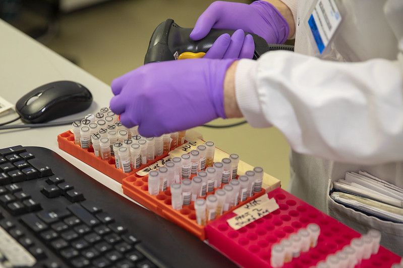 Researchers at a coronavirus testing laboratory in Leeds. Image courtesy of HM Treasury via Creative Commons. United Kingdom, 2020. 