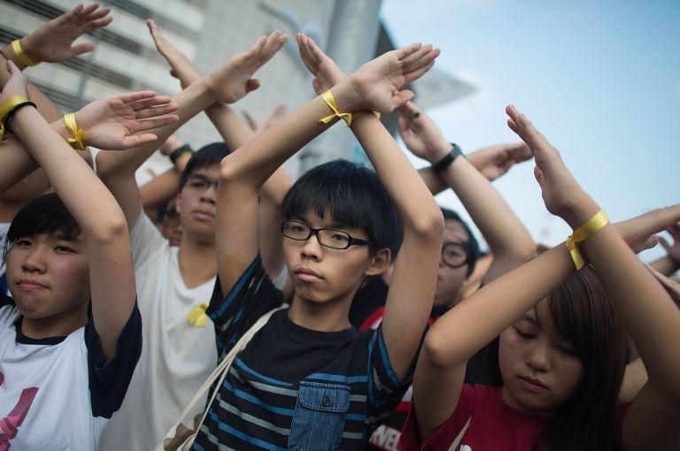Joshua Wong (center) leading pro-democracy protests in Hong Kong. Image by Anthony Kwan/Getty Images. China, 2014.