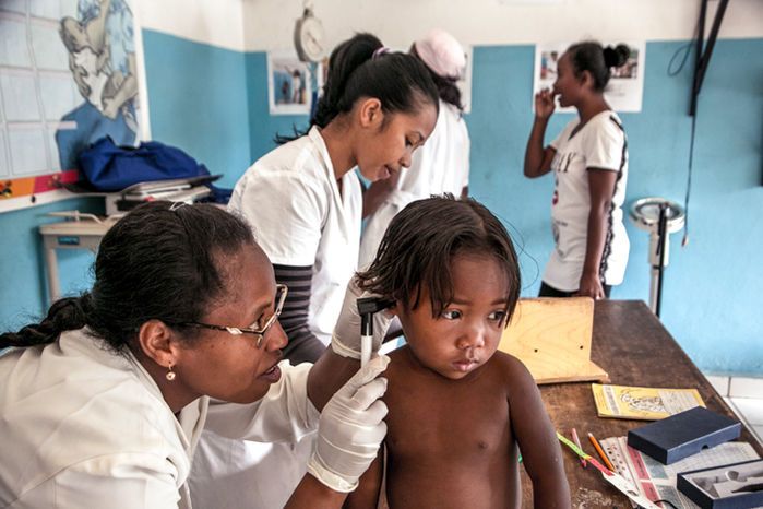 Nurses at the Ranomafana health center monitor the growth of children for malnutrition. Image by Rijasolo. Madagascar, 2019.