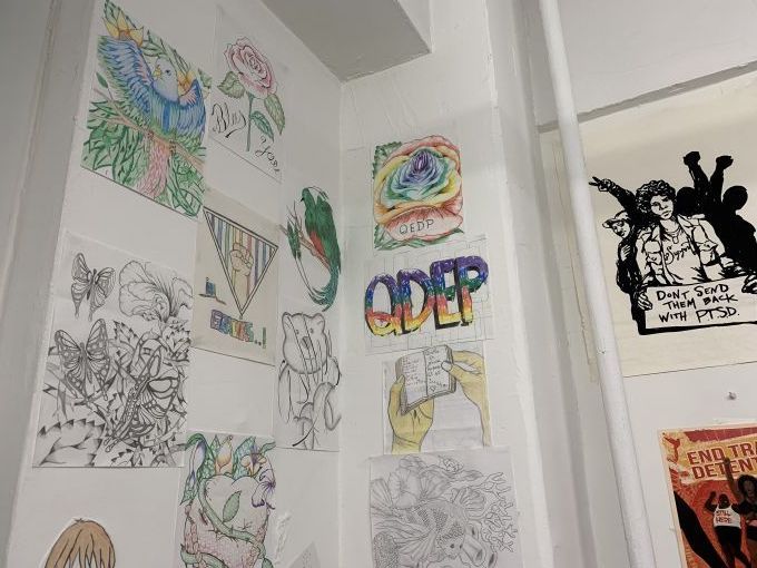 Drawings featured on one of the walls of the Queer Detainee Empowerment Project’s office. Several were created by detainees and sent to the organization from detention centers. Image by Adithi Ramakrishnan. United States, 2020.