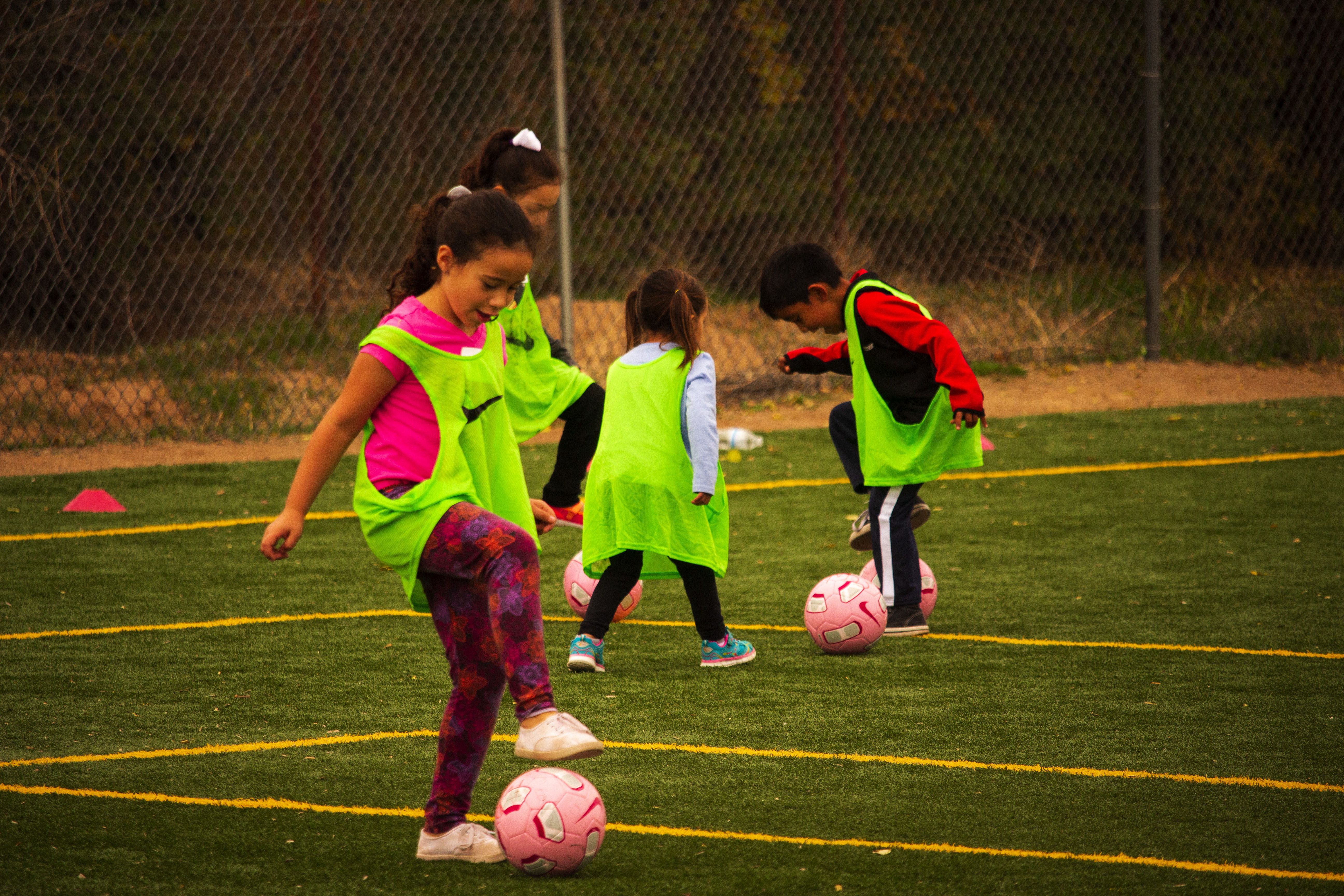Students train muscle memory and soccer stance through the use of touches—"left, right touches" are one of the most practiced soccer drills as  they improve footwork with the ball. Image by Viridiana Vidales Coyt, United States, 2017.