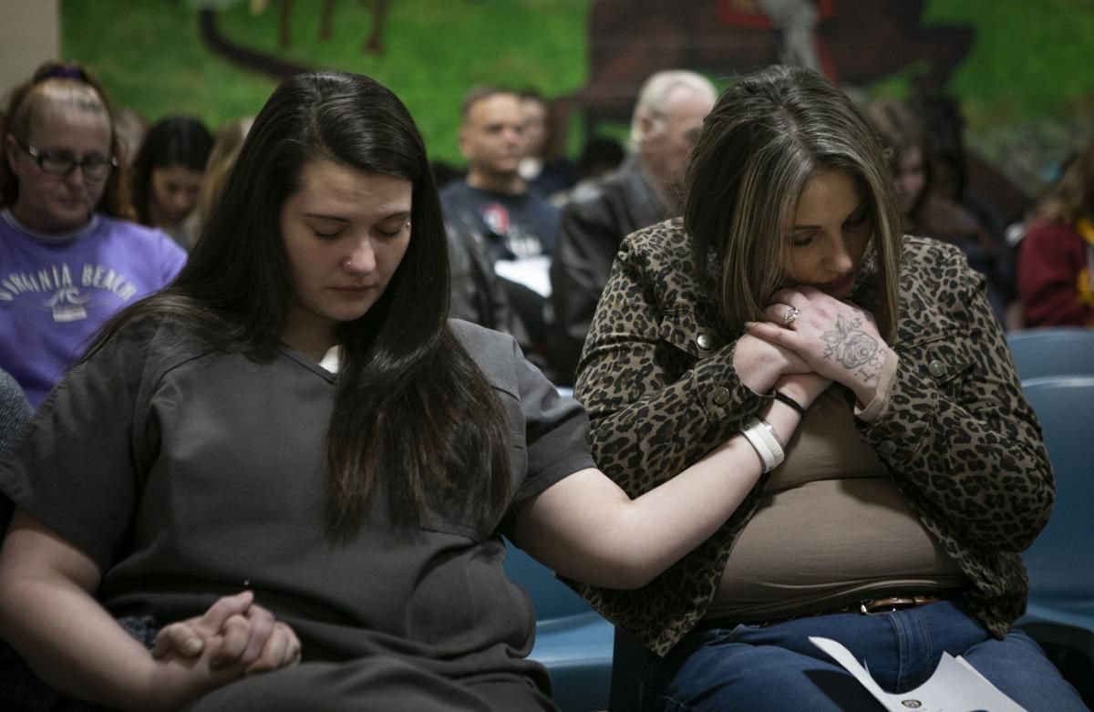 In January 2020, Tera Crowder, right, visits her sister Stephanie, left, at a family night for HARP at the Chesterfield County Jail. Image by Julia Rendleman. United States, 2020.