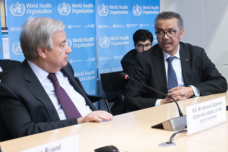 UN Secretary-General António Guterres with Tedros Adhanom Ghebreyesus Director-General of World Health Organization (WHO) during strategic briefing on COVID-19 at Strategic Health Operations Centre (SHOC) at the WHO headquarters in Geneva in February. Image UN Photo / Jean Marc Ferré. Switzerland, 2020.