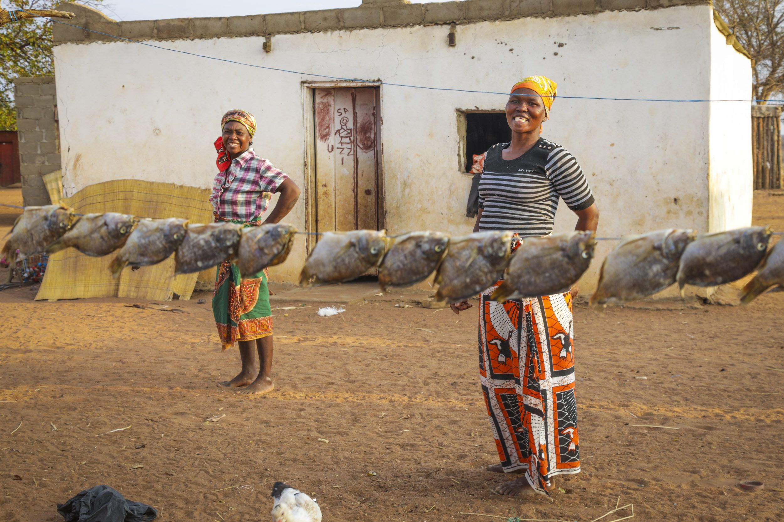 Women of the Mavoze community living inside the Limpopo National Park. Five communities await removal from the park. Image from AfricanDrone/Oxpeckers. Mozambique, 2018.