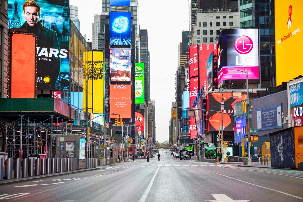 No crowds in Times Square after self-quarantine and social distancing was put in place in New York City to slow the spread of the COVID-19 pandemic. Image by Shutterstock. United States, 2020.