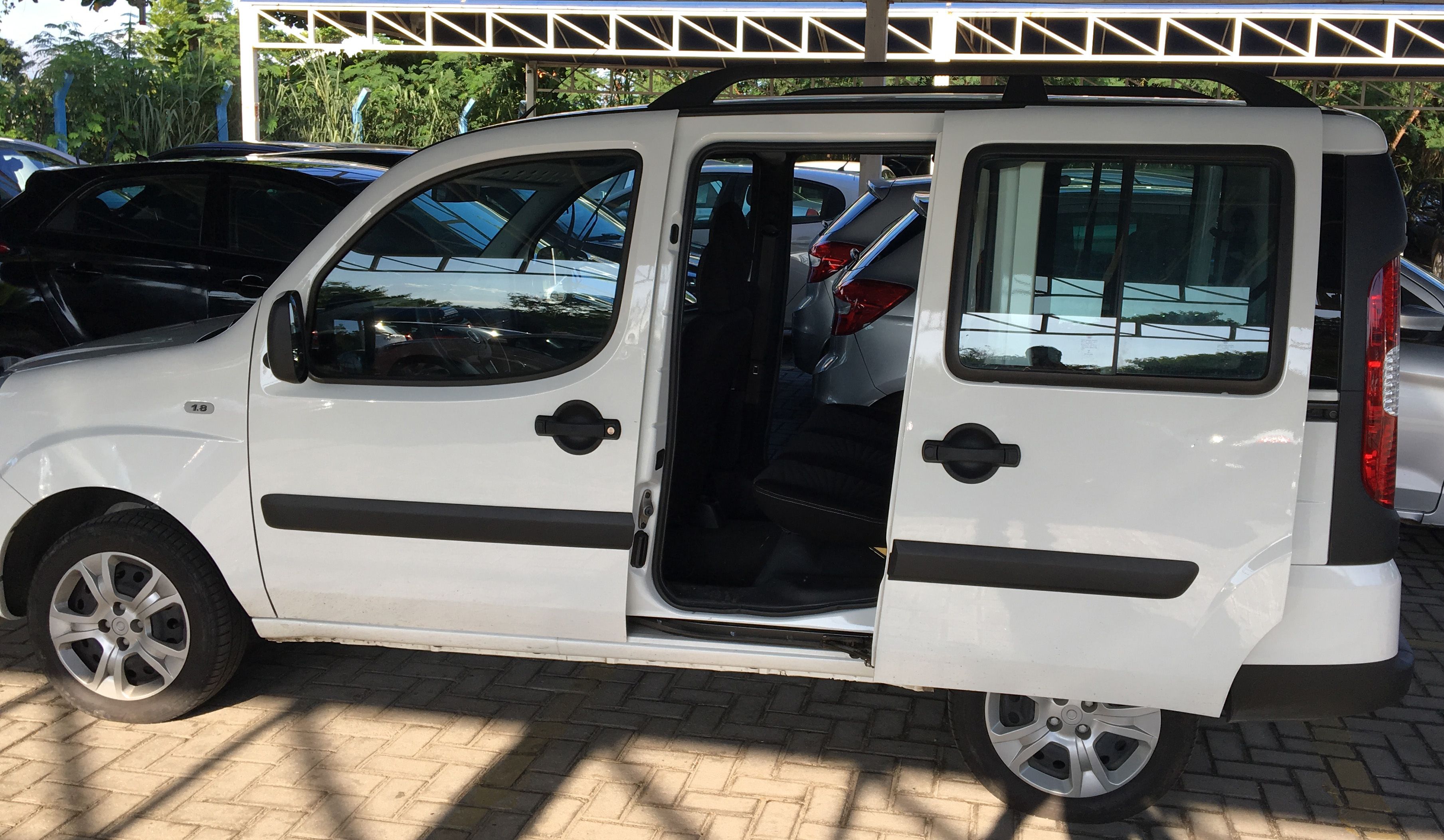 This 128-horsepower Fiat Doblo was the largest vehicle available for rent at Rio de Janeiro's international airport. The five-speed manual transmission might be unfamiliar to many Americans, and cars with automatic transmission are rare in Brazil. This grossly under-powered vehicle had a difficult time climbing steep hills. Image by Mark Hoffman. Brazil, 2017.