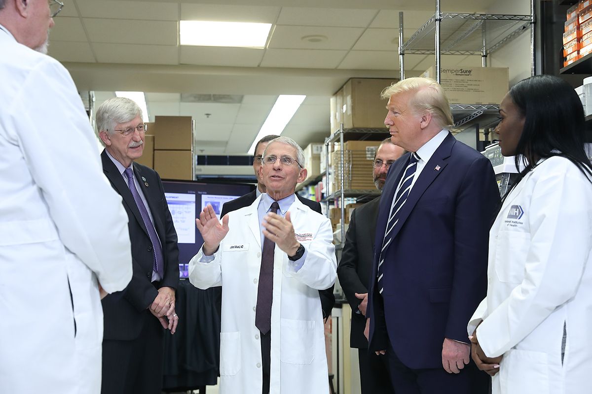 From left: VRC Deputy Director Dr. Barney Graham, NIH Director Dr. Francis Collins, VRC Director John Mascola, Department of Health and Human Services Secretary Alex Azar, President Trump, and VRC Research Fellow Dr. Kizzmekia Corbett. Image courtesy National Institutes of Health. United States, 2020.