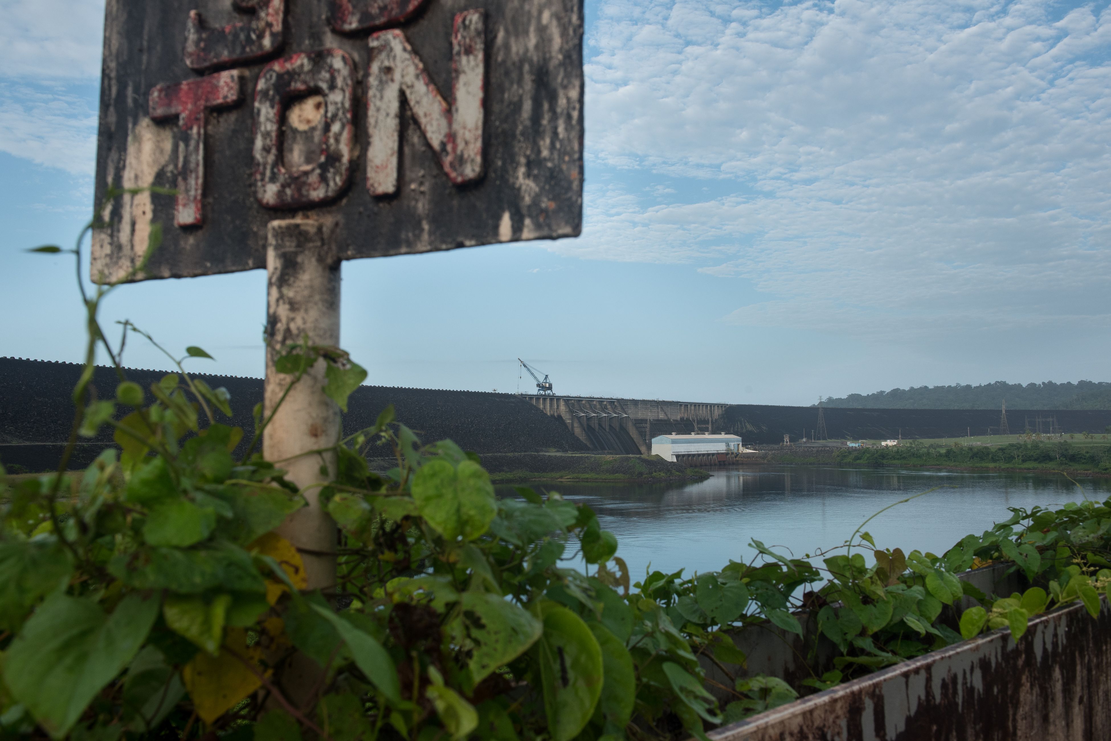 Alcoa's Afobaka Dam jolted Suriname into modernity, even as it flooded 618 square miles of jungle and displaced 6,000 people. Now, as Alcoa leaves Suriname, it is a centerpiece of the country's economic crisis and political turmoil. By Stephanie Strasburg