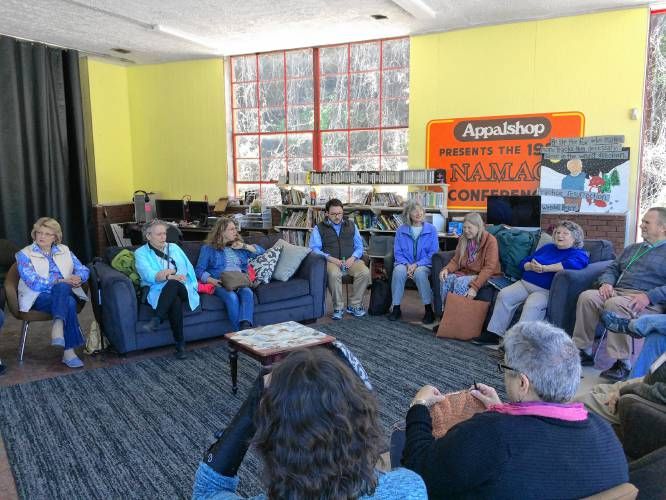 Hands Across the Hills participants from Leverett and Letcher County, Ky.  share a focused discussion of issues. Image by Richie Davis. United States, 2018.