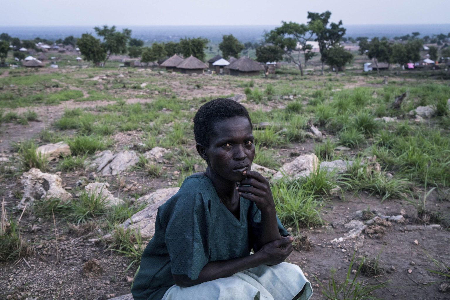 Uncertain future: Tabu Raida sits for a portrait in the Imvepi settlement for refugees that have fled from South Sudan to Uganda. Image by Adriane Ohanesian & Gael Cloarec / Getty Images.