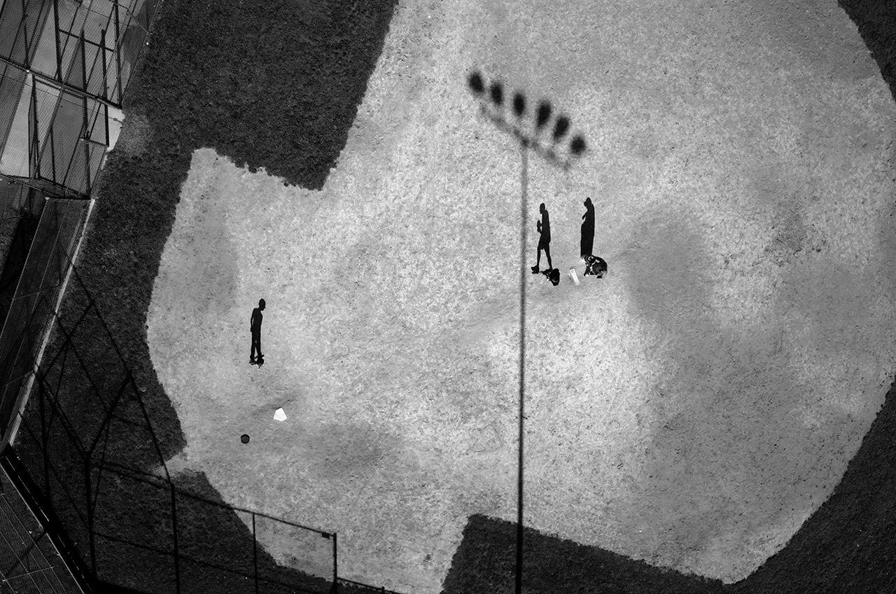 “Baseball practice in Montgomery County, Maryland. According to records obtained from the FAA, which issued 1,428 domestic drone permits between 2007 and early 2013, the National Institute of Standards and Technology and the U.S. Navy have applied for drone authorization in Montgomery County.” Image by Tomas van Houtryve. United States, 2014.