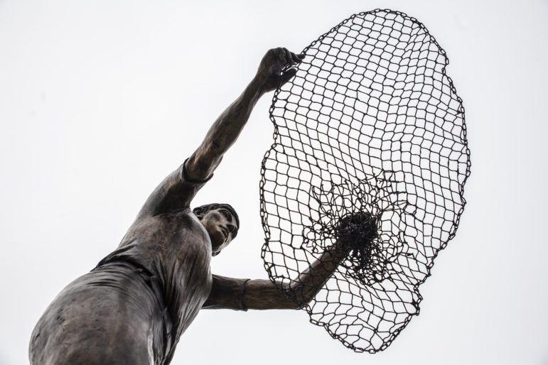 A statue outside the Maritime and Seafood Industry Museum in Biloxi. Image by Eric J. Shelton for Mississippi Today. United States, 2020.