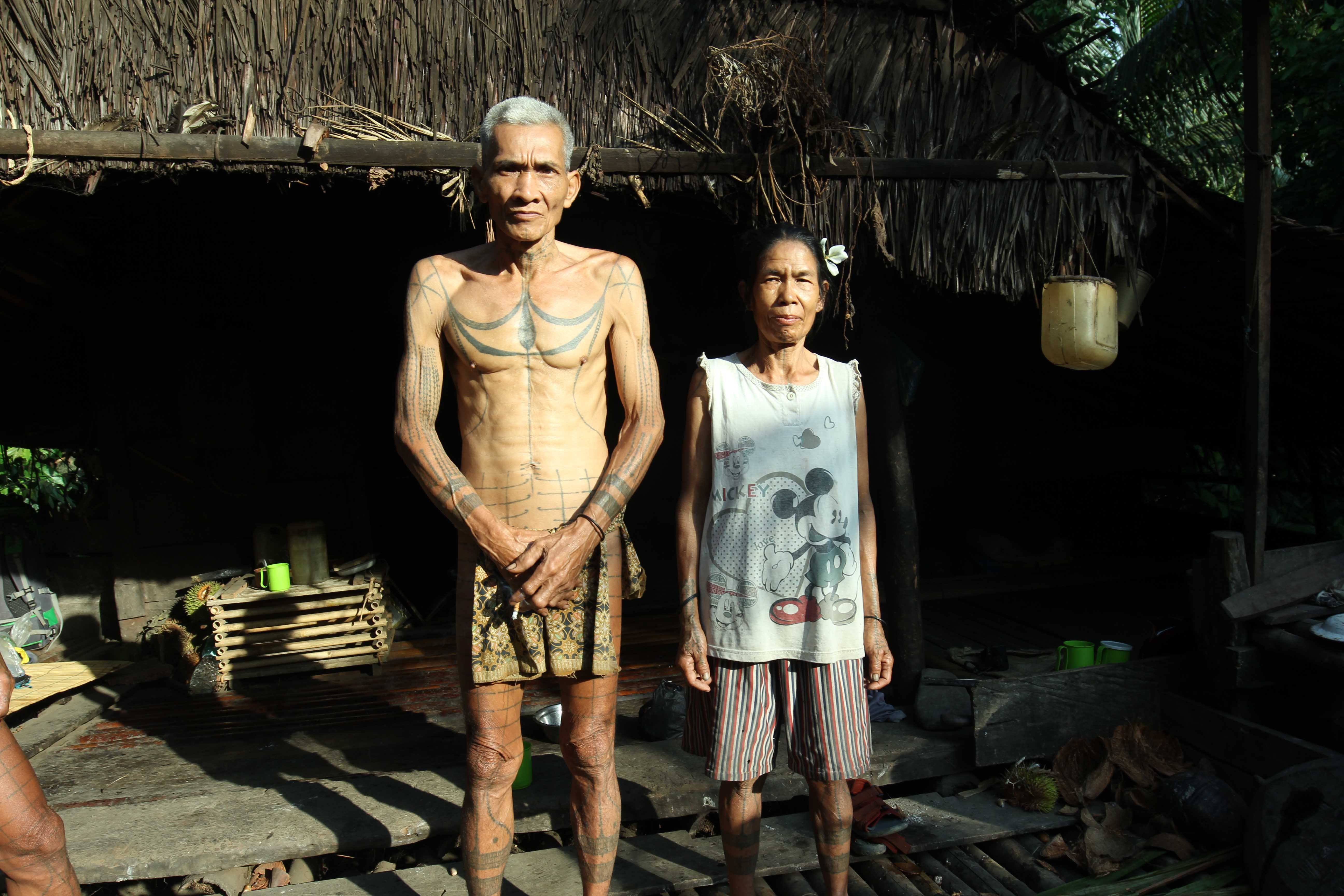 Teu Takbabalen and his wife at a pig farm in Siberut Mentawai Islands. Image by Febrianti. Indonesia, 2020.