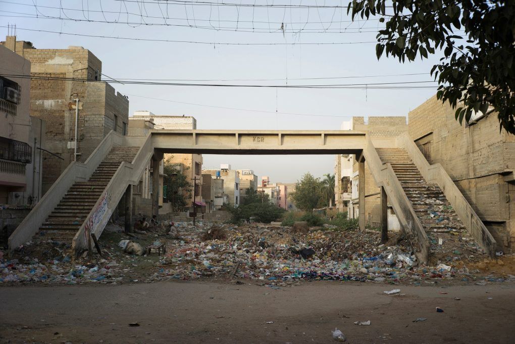 Footbridge near Orangi Town Station, Karachi, Pakistan. Still image from KCR, 2014-2017, nine-channel multimedia installation. Image by Ivan Sigal. Pakistan, 2017.