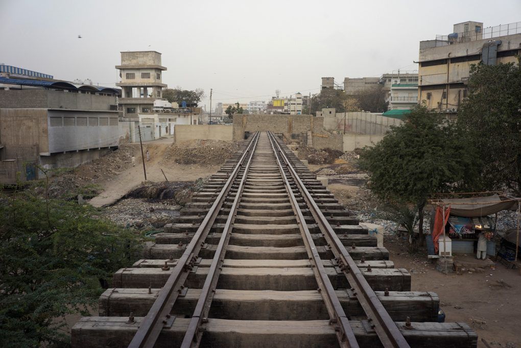 Wall across Railway Bridge, Orangi Town Station, Karachi, Pakistan. Still image from KCR, 2014-2017, nine-channel multimedia installation. Image by Ivan Sigal. Pakistan, 2017.