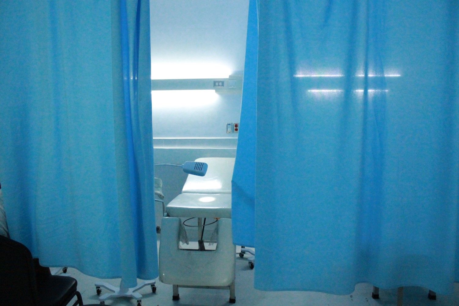 There are five beds in the ward where the cervical cancer screening takes place. One bed is occupied by a woman in labor and one is for women who need treatment but the other three are open for screening. Lemour ended up testing positive for pre-cancerous lesions. Thankfully, Lemour was able to get treatment that same day. While the cryotherapy treatment is painful, she said that she is glad it is finished and that she could live a life free from cervical cancer. Lemour plans on going back to her community to educate women about cervical and breast cancer. Image by Anna Russell. Haiti, 2017.