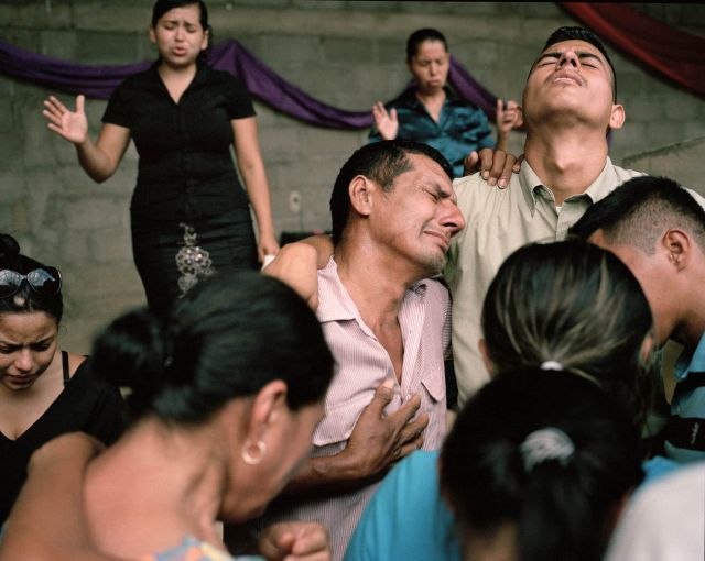 Family members mourn the death of Darwin Franco, a community organizer in Honduras. Later that evening his family received death threats. Image by Dominic Bracco II. Honduras, 2015.