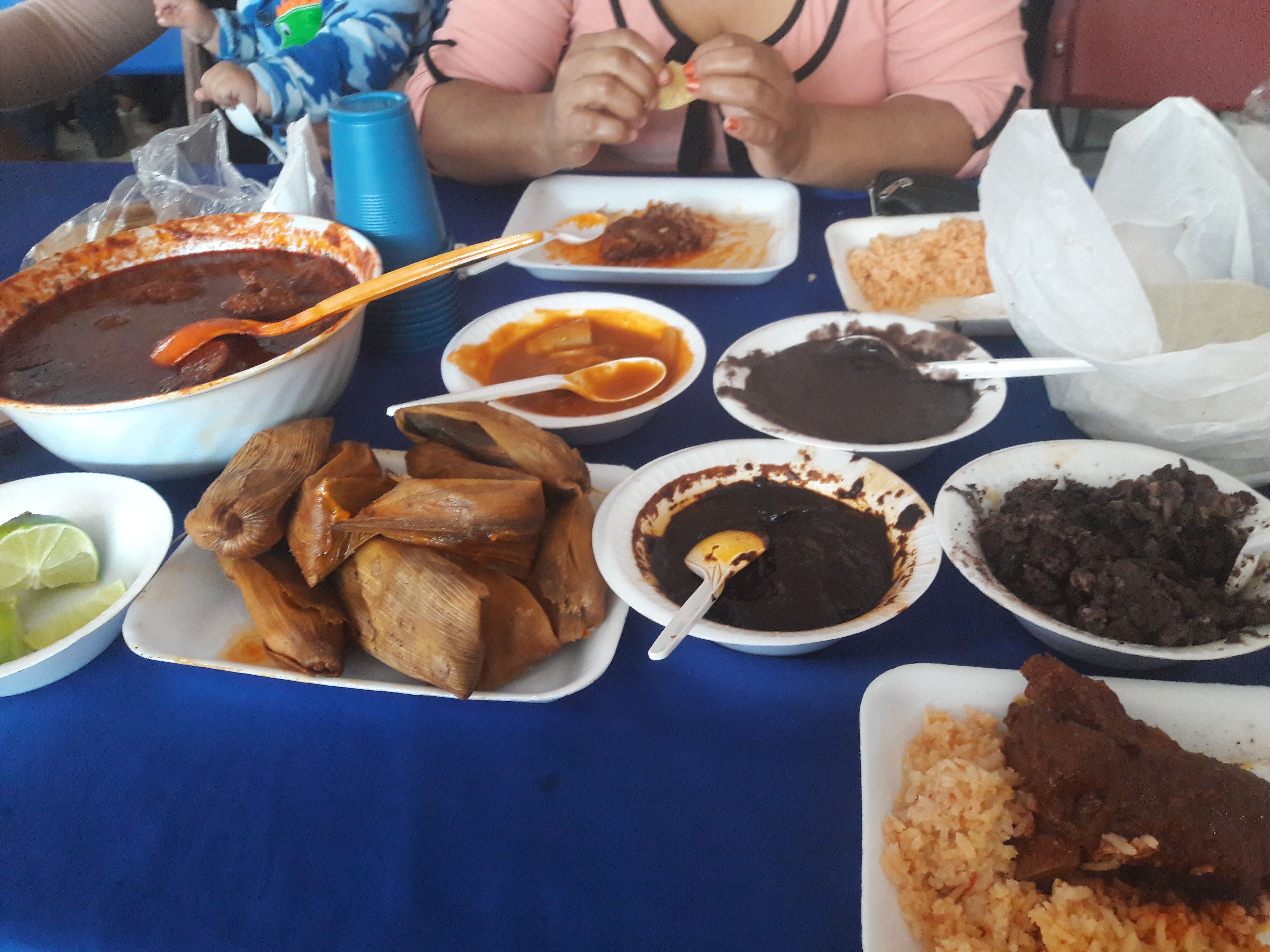 Delicious dishes that will besiege Carnaval include beef barbecue, stuffed chile, guacamole, pig's blood, yellow rice, and tamales. Image by Jonathan Custodio. Mexico, 2018.