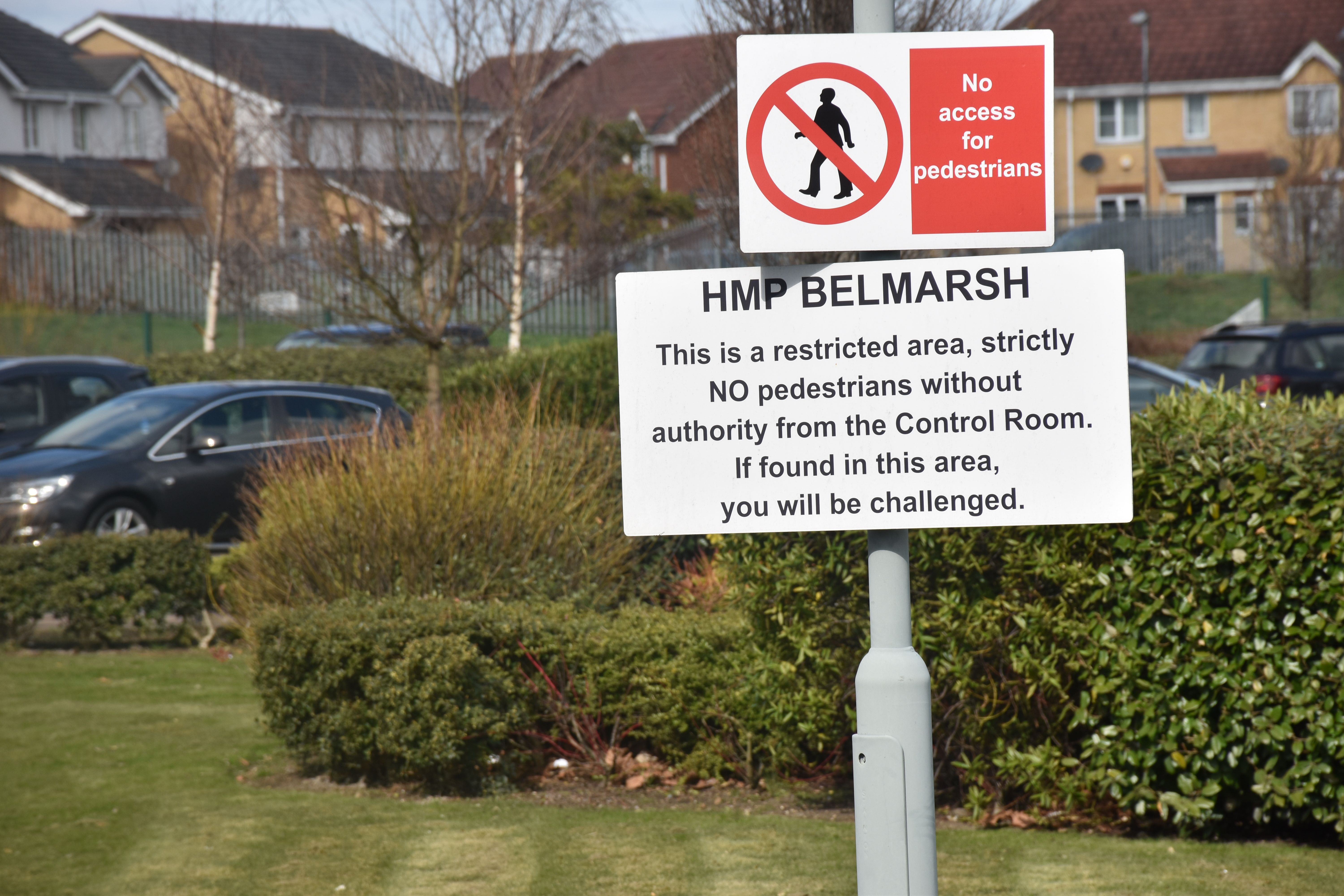 A sign outside H.M.P Belmarsh's front wall reads, "No access for pedestrains." Belmarsh is London's only maximum security prison. Image by Paul LeBlanc. United Kingdom, 2018.