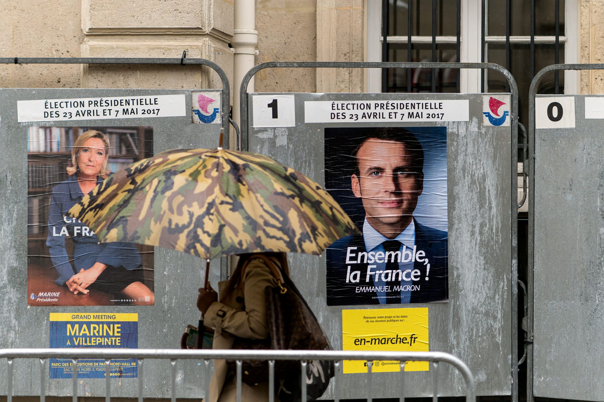 Posters promoting candidates in the 2017 French presidential election, Marine Le Pen and Emmanuel Macron. Image by Lorie Shaull. France, 2017.