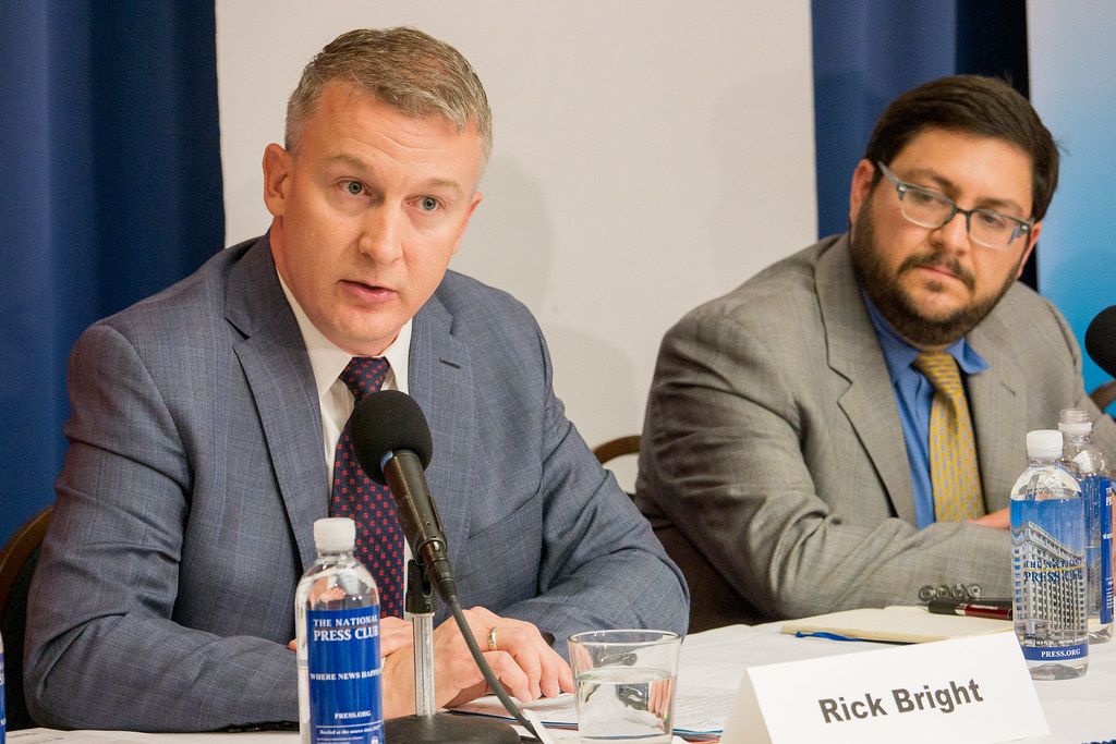 Rick Bright (left), former director of the Biomedical Advanced Research and Development Authority (BARDA), alleges in a whistleblower complaint that officials punished him for refusing to deliver funds to pharmaceutical firms run by "cronies." Image by Alliance for Health Policy / Creative Commons. United States, 2016. 