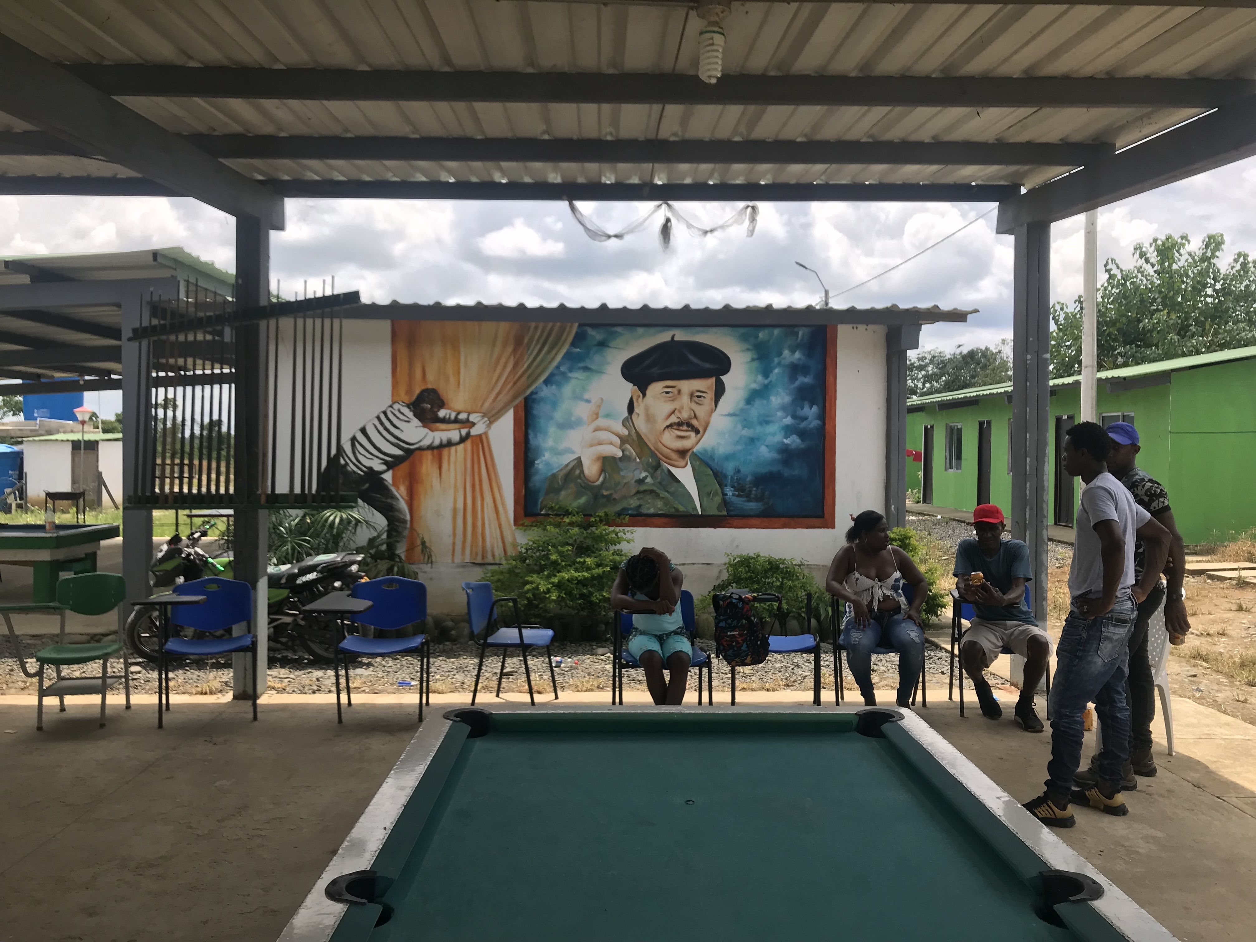 Former FARC members living in transition zones have painted their homes and public areas with colourful murals of the group's leaders, like this one in Tumaco. Image by Mariana Palau/TNH. Colombia, 2019. 