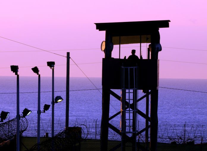 A watchtower at the Guantánamo Bay prison camp at dusk. Image by Gino Reyes. Cuba, 2011.