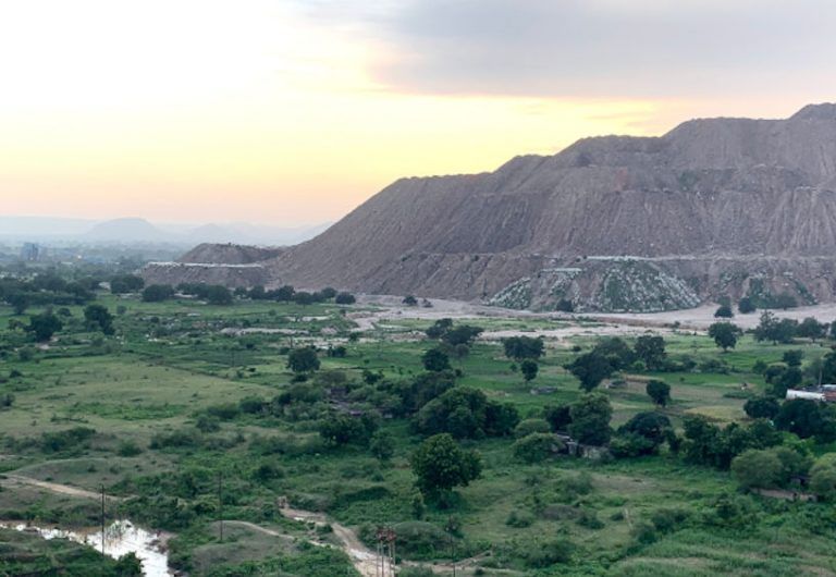Decades of mining has changed the landscape of what was once a forested area of Madhya Pradesh, in central India. Electricity producer THDC India Limited plans to build another opencast mine, like the one pictured above, in Singrauli, India’s fourth most-critically polluted area. Image by Tish Sanghera. India, 2019.