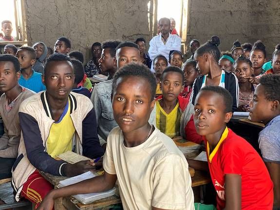 Hagirso at 21 in fourth grade classroom. Image by Anne Thurow. Ethiopia, 2019.