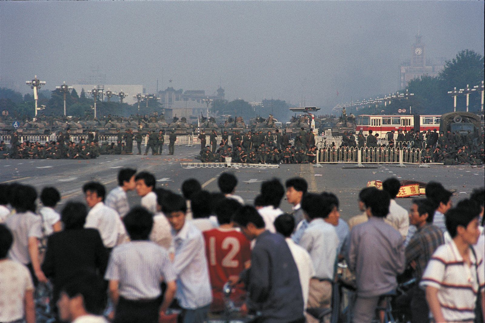 Demonstrators and troops during the Tiananmen Square protests. Image by Kao Bian. Beijing, 1989.